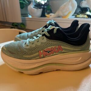 Hoka Aqua and Black Athletic Shoes